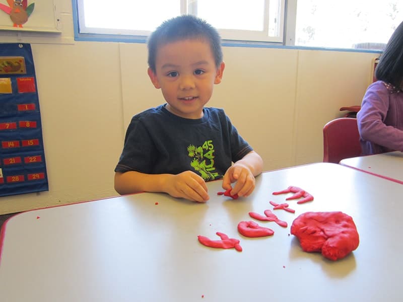 Student using clay