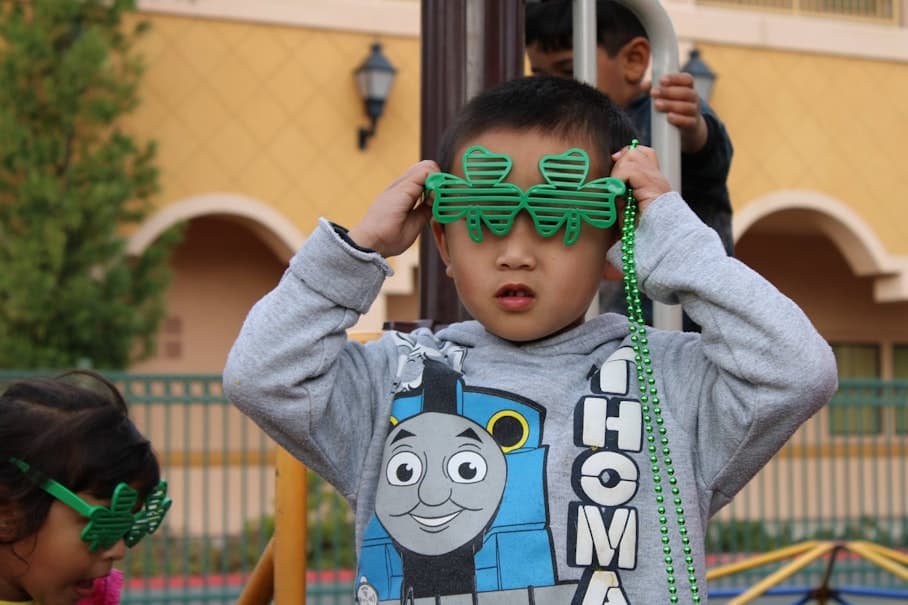 Student with shamrock glasses