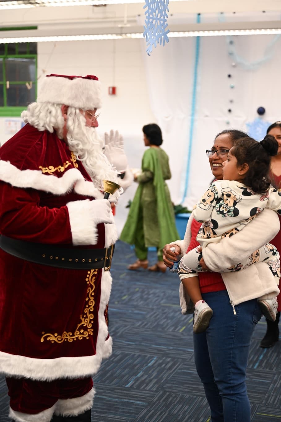 Santa talking to student